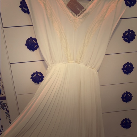 Francesca's Collections Dresses & Skirts - Cream/Ivory Lace dress- never worn! Francesca's Collections Dresses & Skirts - Cream/Ivory Lace dress- never worn!